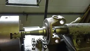 A machine that is working on some kind of metal